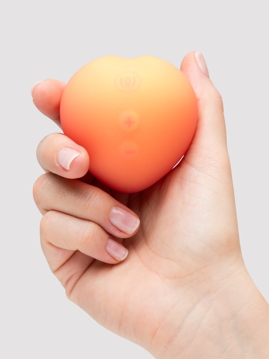 Womanizer Peach Toy Pleasure Air Klitorisstimulator - Amorana